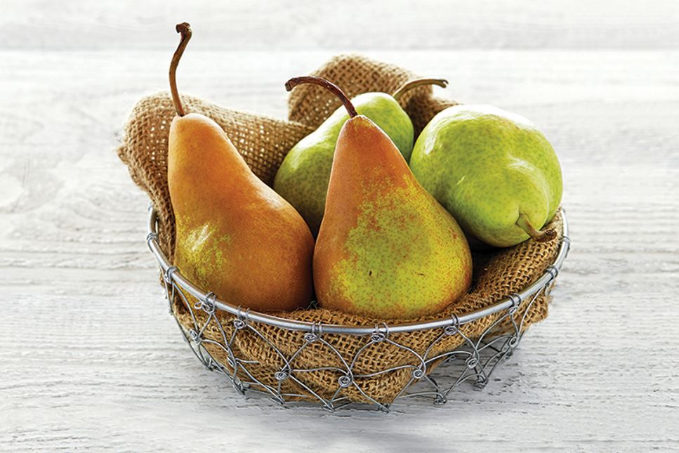 A bowl of red-green pears