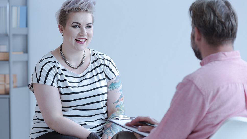 Person speaking to RDN about sex-specific nutrition recommendations and how to tailor them for transgender people